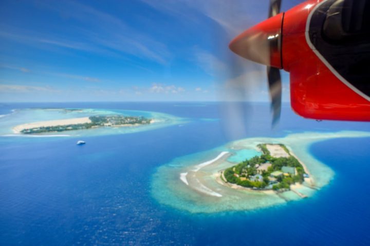 https://www.pexels.com/photo/aerial-photography-of-red-plane-1456296/