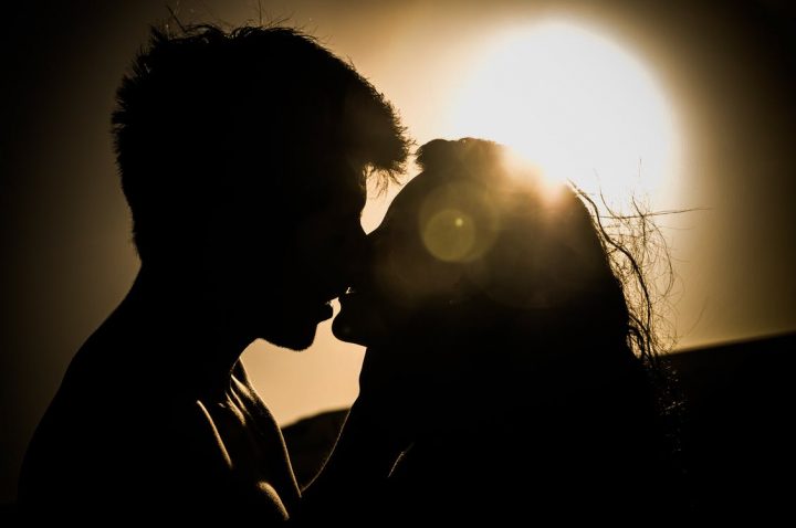 https://www.pexels.com/photo/silhouettes-of-couple-kissing-against-sunset-41068/