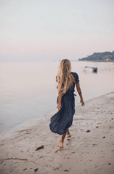 https://www.pexels.com/photo/photo-of-woman-walking-on-seashore-2072583/