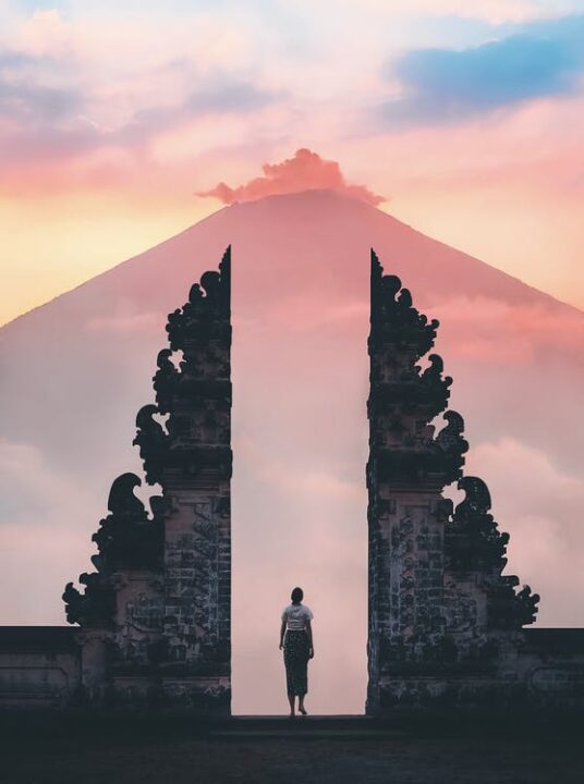 https://www.pexels.com/photo/photo-of-person-standing-on-temple-2659475/