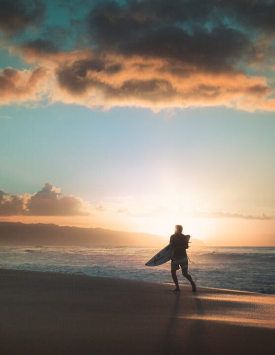 https://www.pexels.com/photo/photo-of-person-running-on-beach-during-golden-hour-3515176/