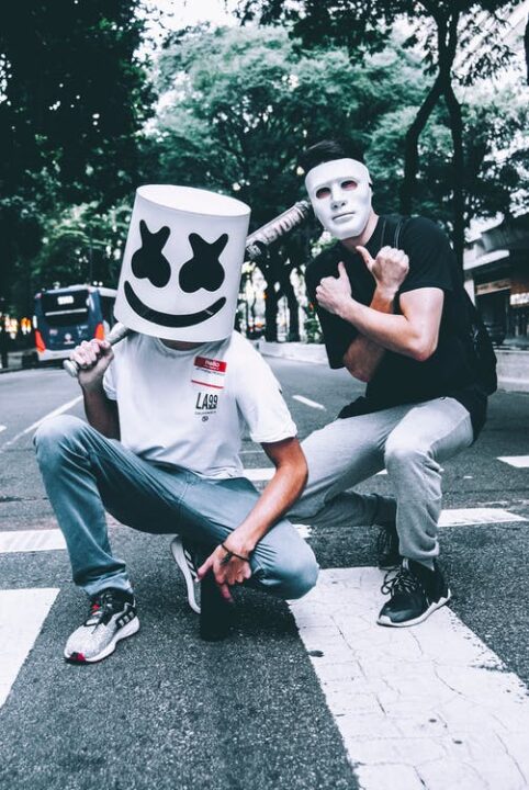 https://www.pexels.com/photo/photo-of-two-men-in-masks-squat-posing-1755829/