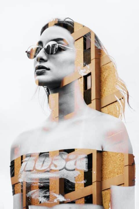 https://www.pexels.com/photo/a-woman-wearing-sunglasses-pasted-on-a-building-wall-2899707/
