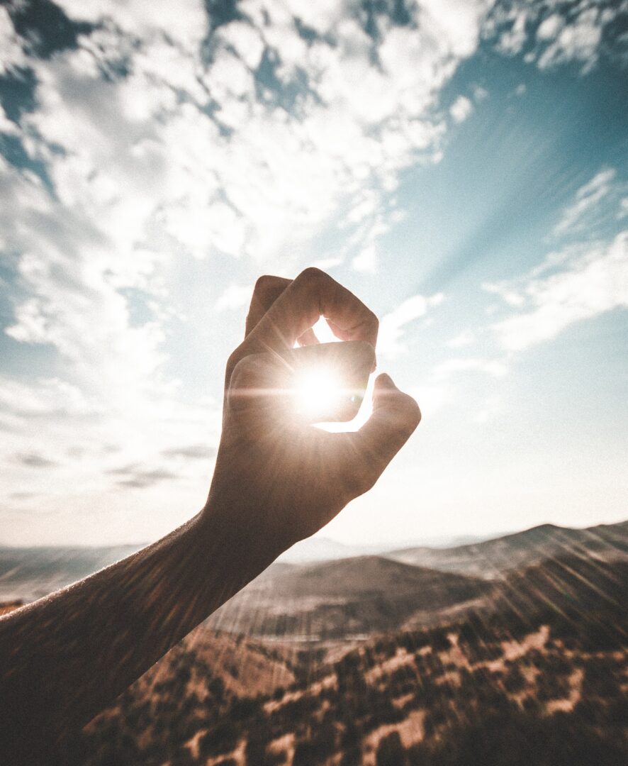 Hand und Sonne