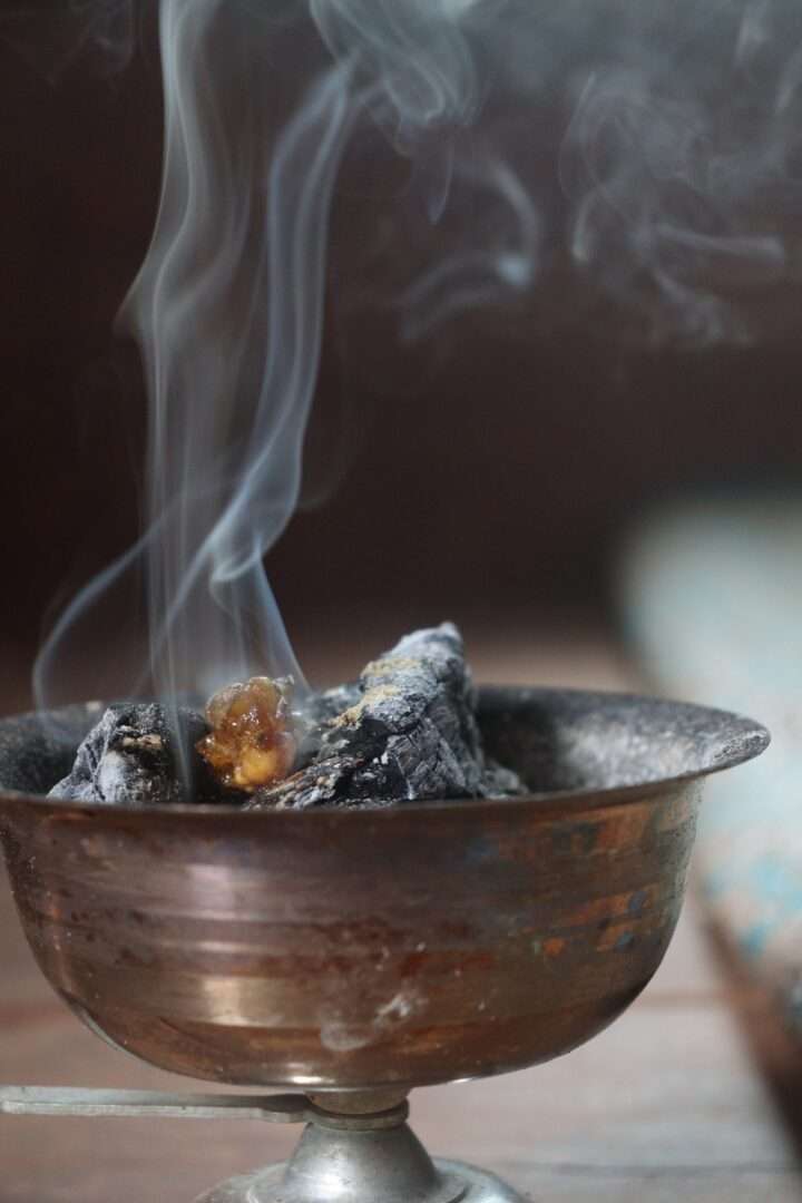 Incense in a metal bowl