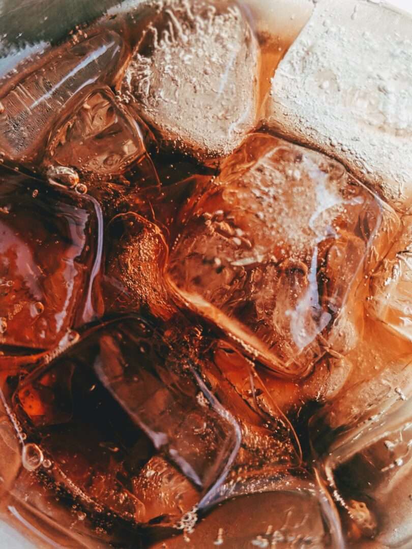 Cola with ice cubes