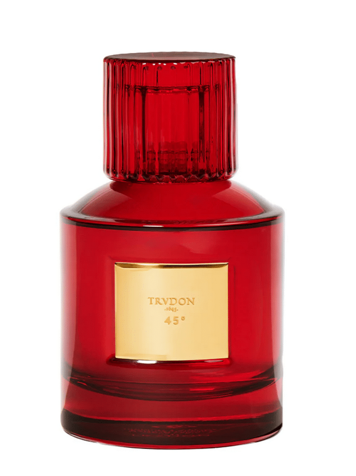 Red perfume bottle Trudon 45° with golden lettering, part of the Nuit Rouge Collection by Trudon.