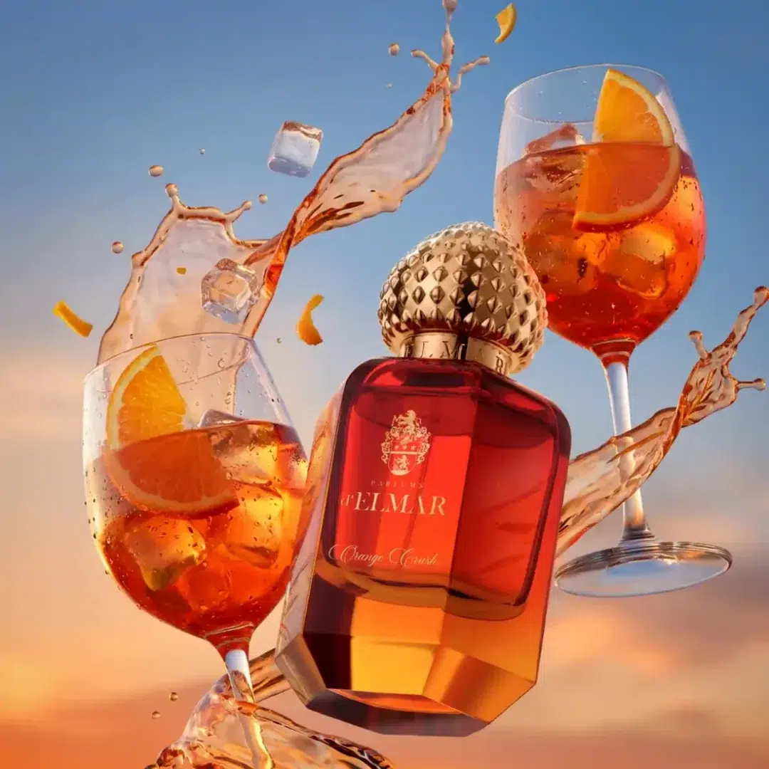 Parfums d'Elmar Orange Crush mit Aperol-Spritz-Gläsern, Orangenscheiben, Eiswürfeln und spritzenden Zitrusnoten